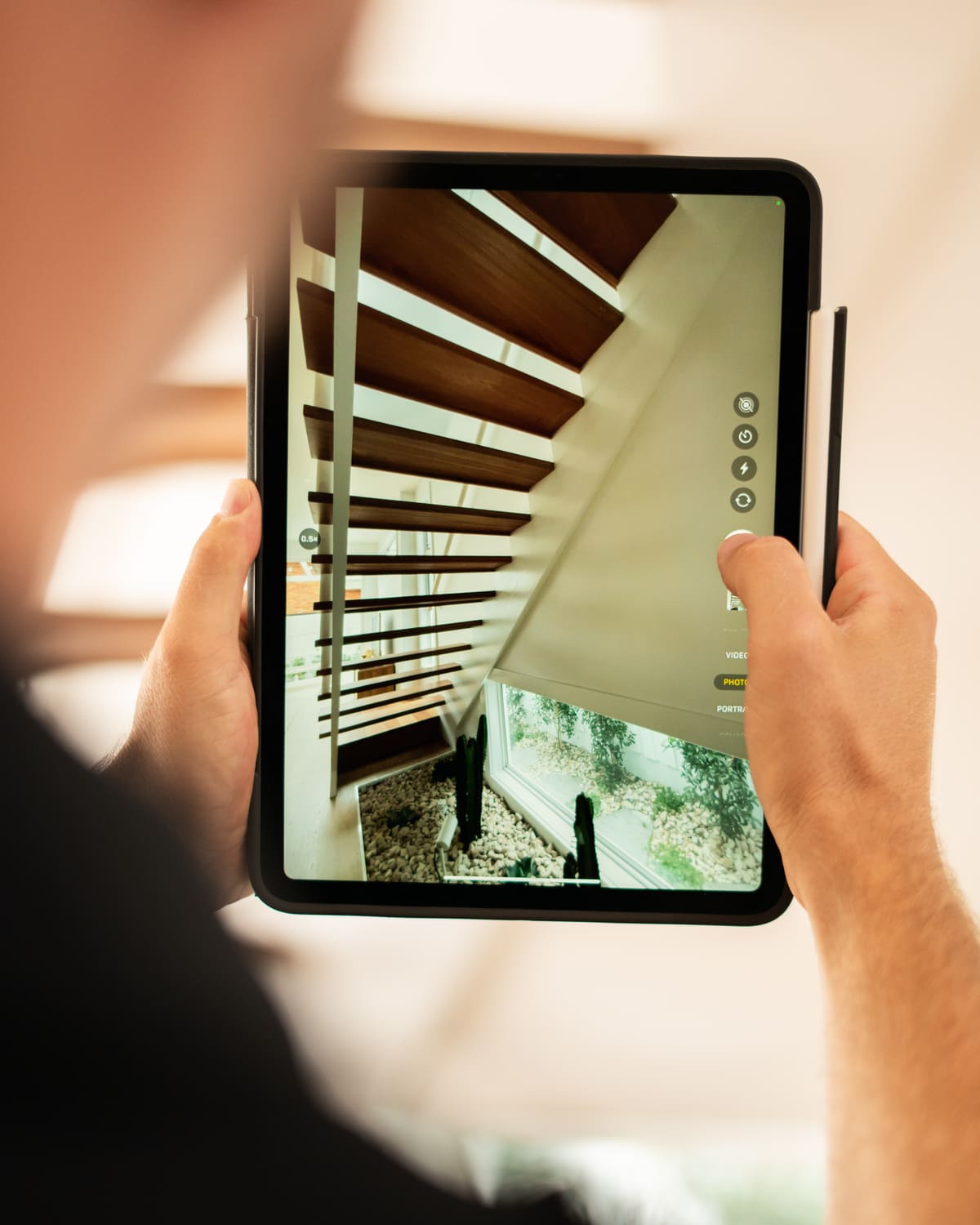 Inspector photographing a staircase for the report